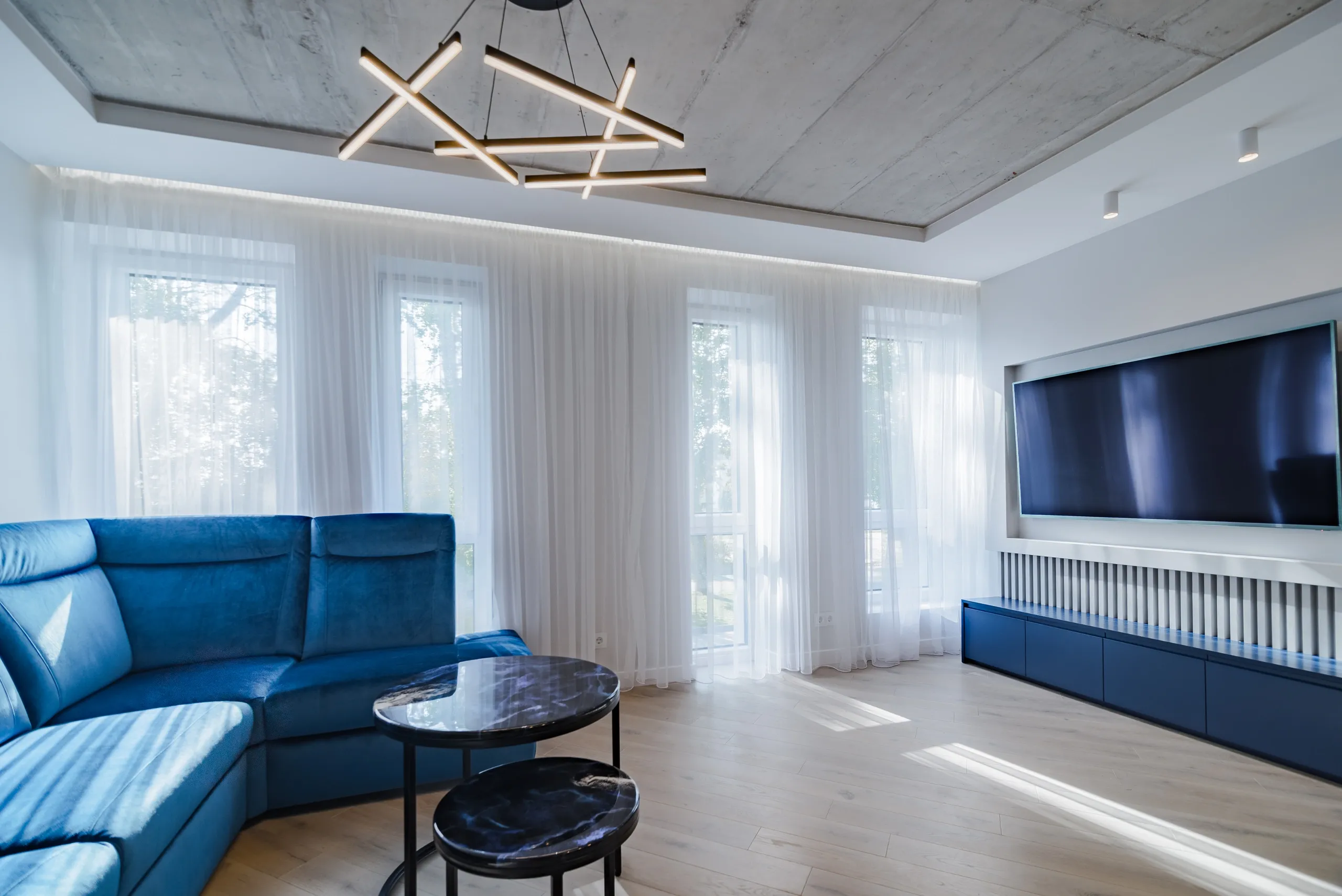 Custom sheer curtains in a light filled room