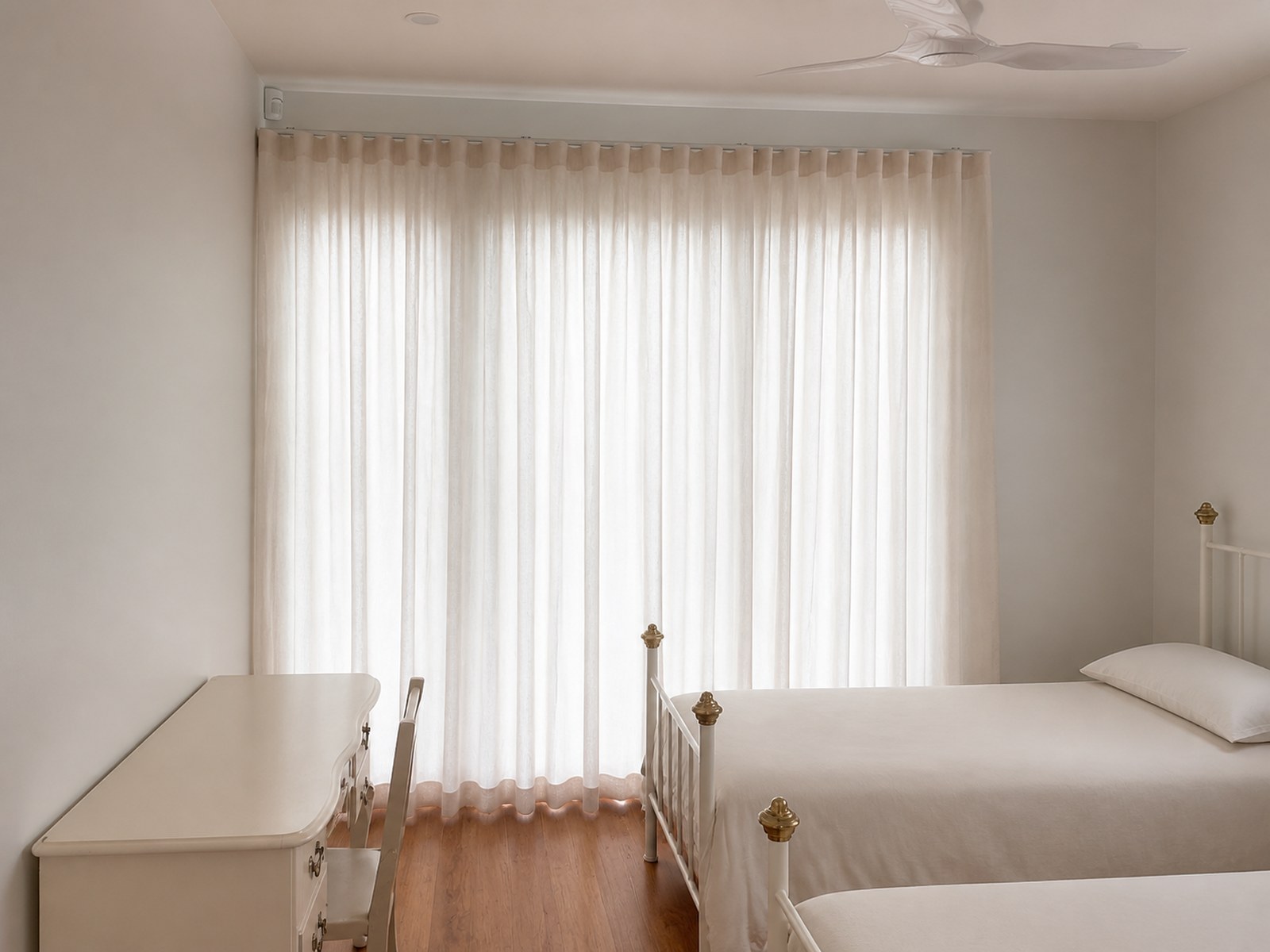 Sheer curtains in a bedroom