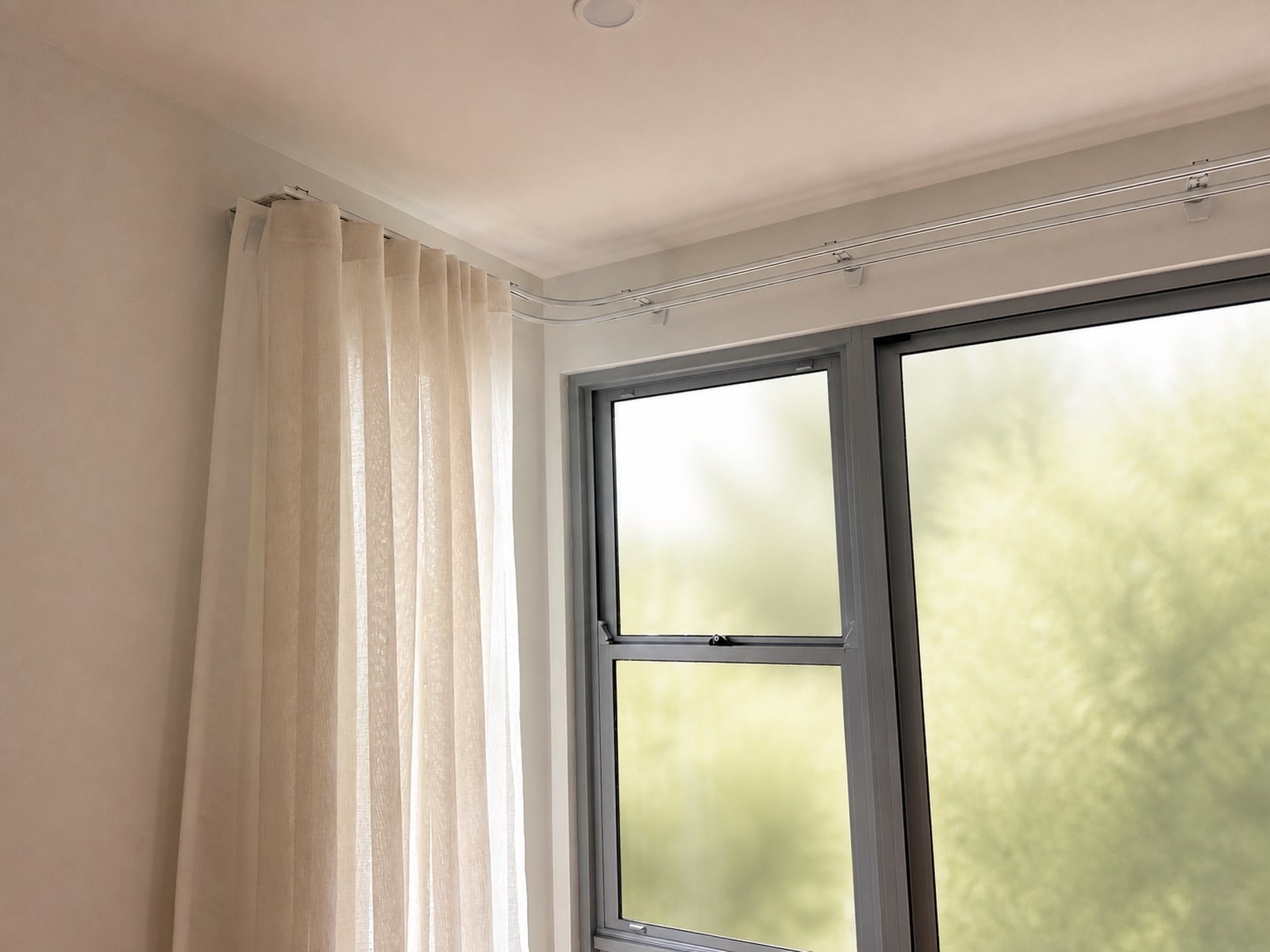 Curtain track and sheer fabric detail